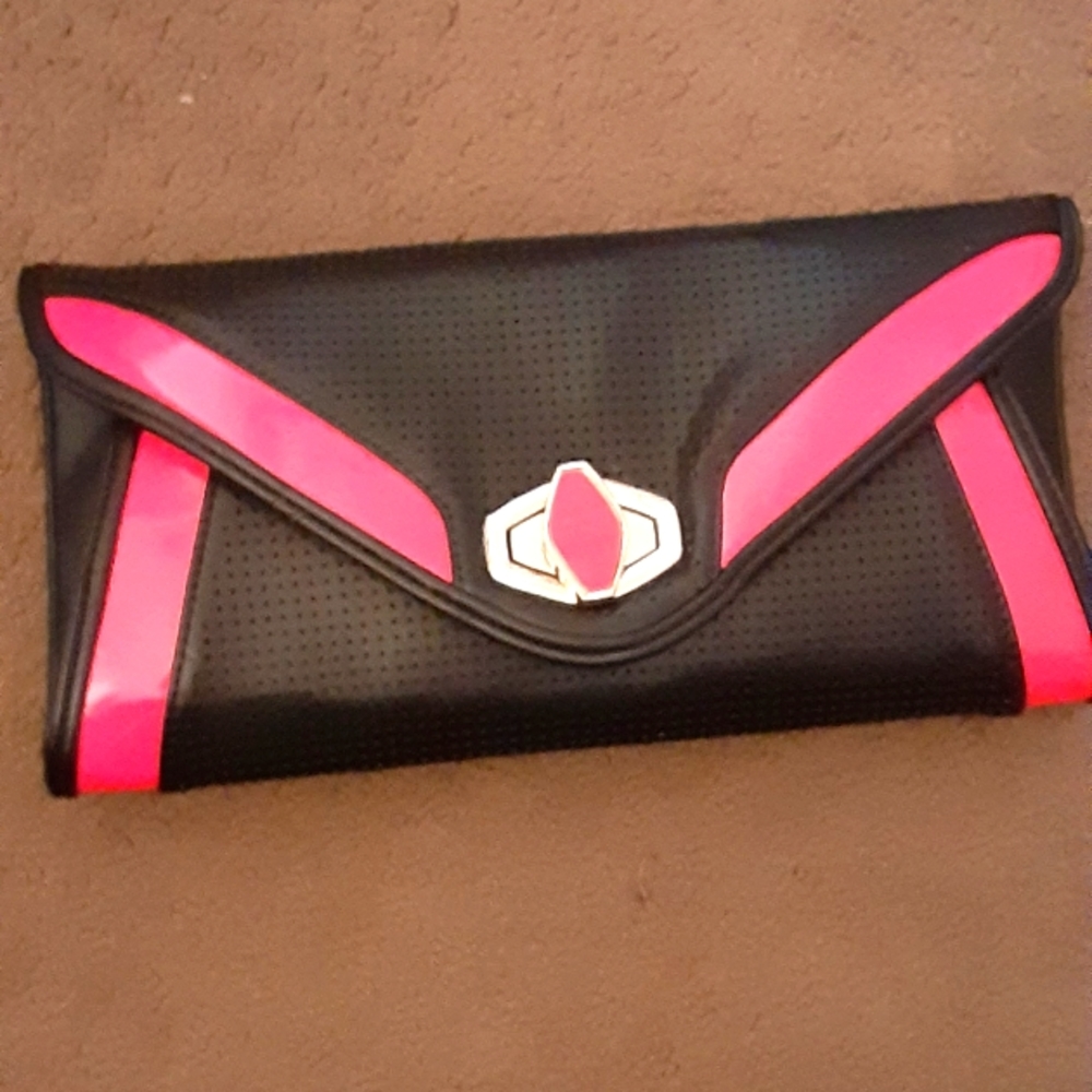 Small hot pink and black turn latch flap open clutch